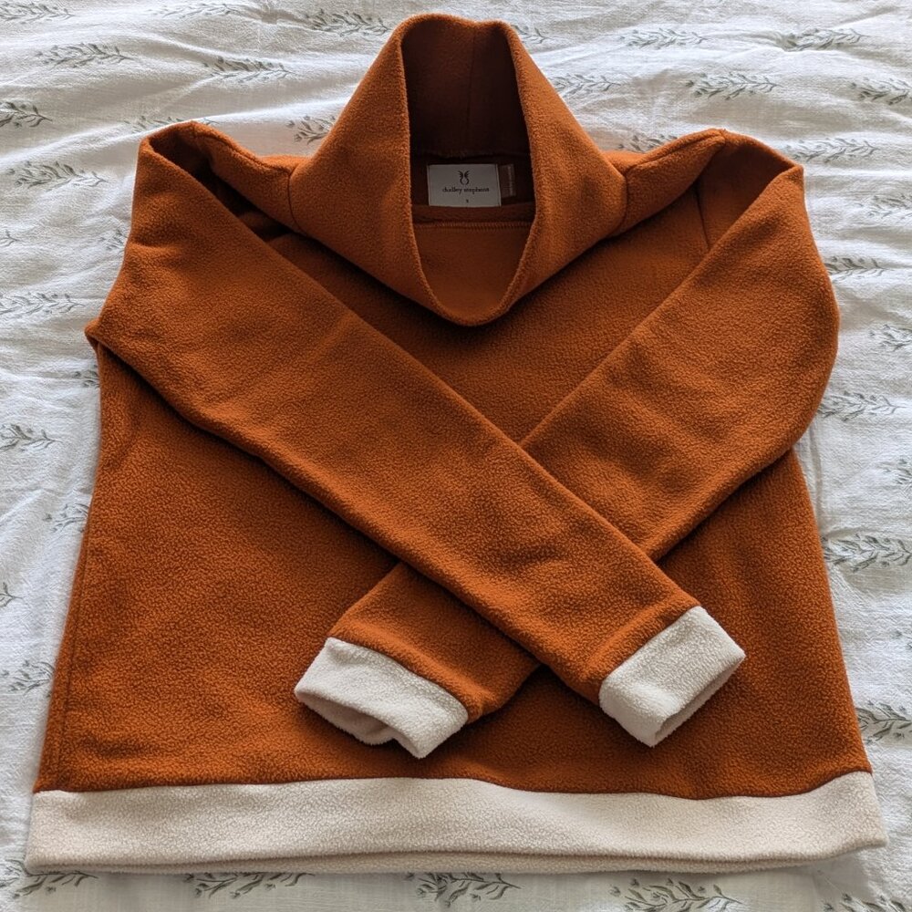 Excellent condition Dudley Stephens orange/cream color block turtleneck
